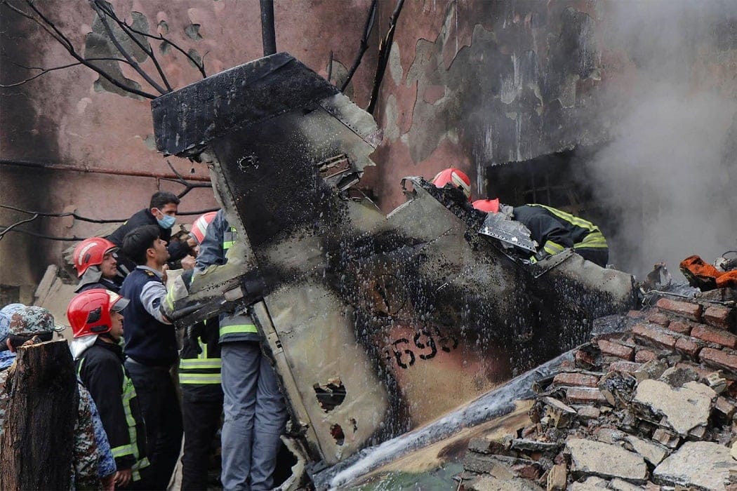 Two pilots and a man on the ground killed in Iran jet crash