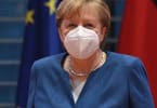 Germany extends lockdown, makes masks mandatory, warns of border closures