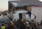 Passenger jet with 100 people crashed into a two story building