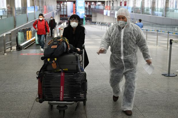 बीजिंगः सर्व परदेशी आगमनाची चाचणी कोविड -१ and आणि अलग ठेवण्यासाठी केली जाईल