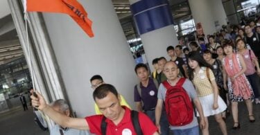 China allows 'organized group' travel to 'relevant countries'