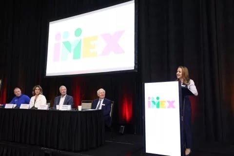 IMEX CEO Carina Bauer nan konferans pou laprès fèmen - koutwazi imaj IMEX