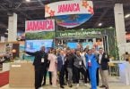 The Jamaica Tourist Board team, including Deputy Director of Tourism Philip Rose, in front of their booth at IMEX America in Las Vegas - image courtesy of Jamaica Tourist Board