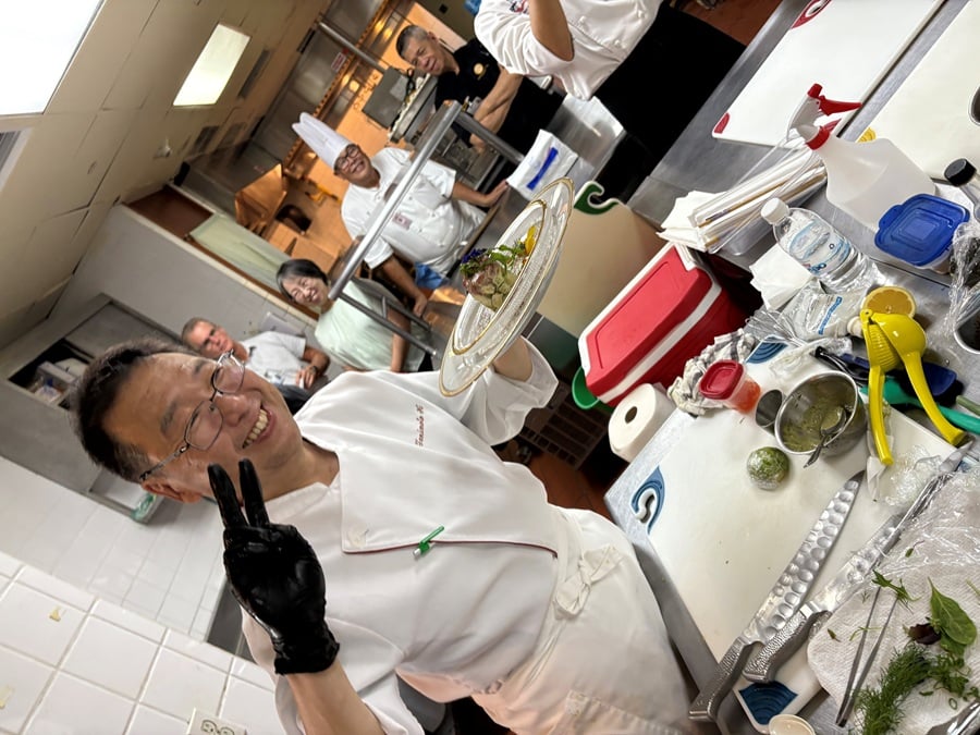 Guam Welcomes Culinary Student Champions from Japan 3 Travel, Tourism & Lifestyle Trends guam 2 Chef Koji Tanimoto resident chef for the Consul General of Japan shares his culinary expertise with students from Guam and Japan at the culinary exchange event at Leo Palace on Wednesday | eTurboNews | eTN