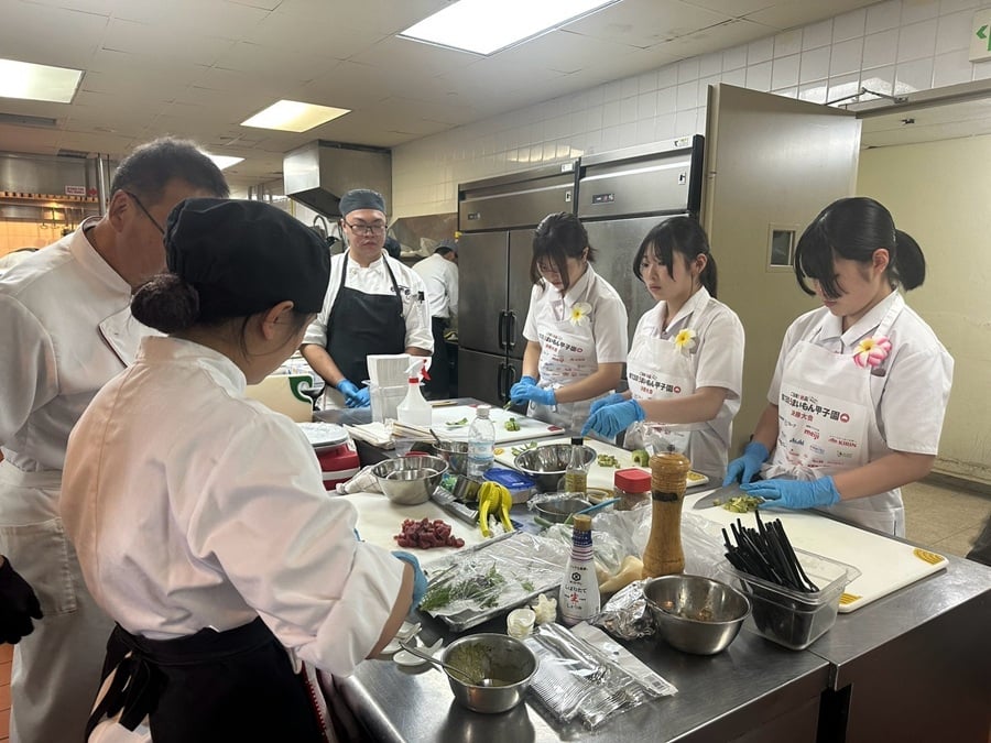 Guam Welcomes Culinary Student Champions from Japan 4 Travel, Tourism & Lifestyle Trends guam 3 Hirosaki Jitsugyo High School students work alongside Guam Community College culinary students instructors and Chef Koji Tanimoto during a culinary exchange at Leo Palace on Wednesday | eTurboNews | eTN